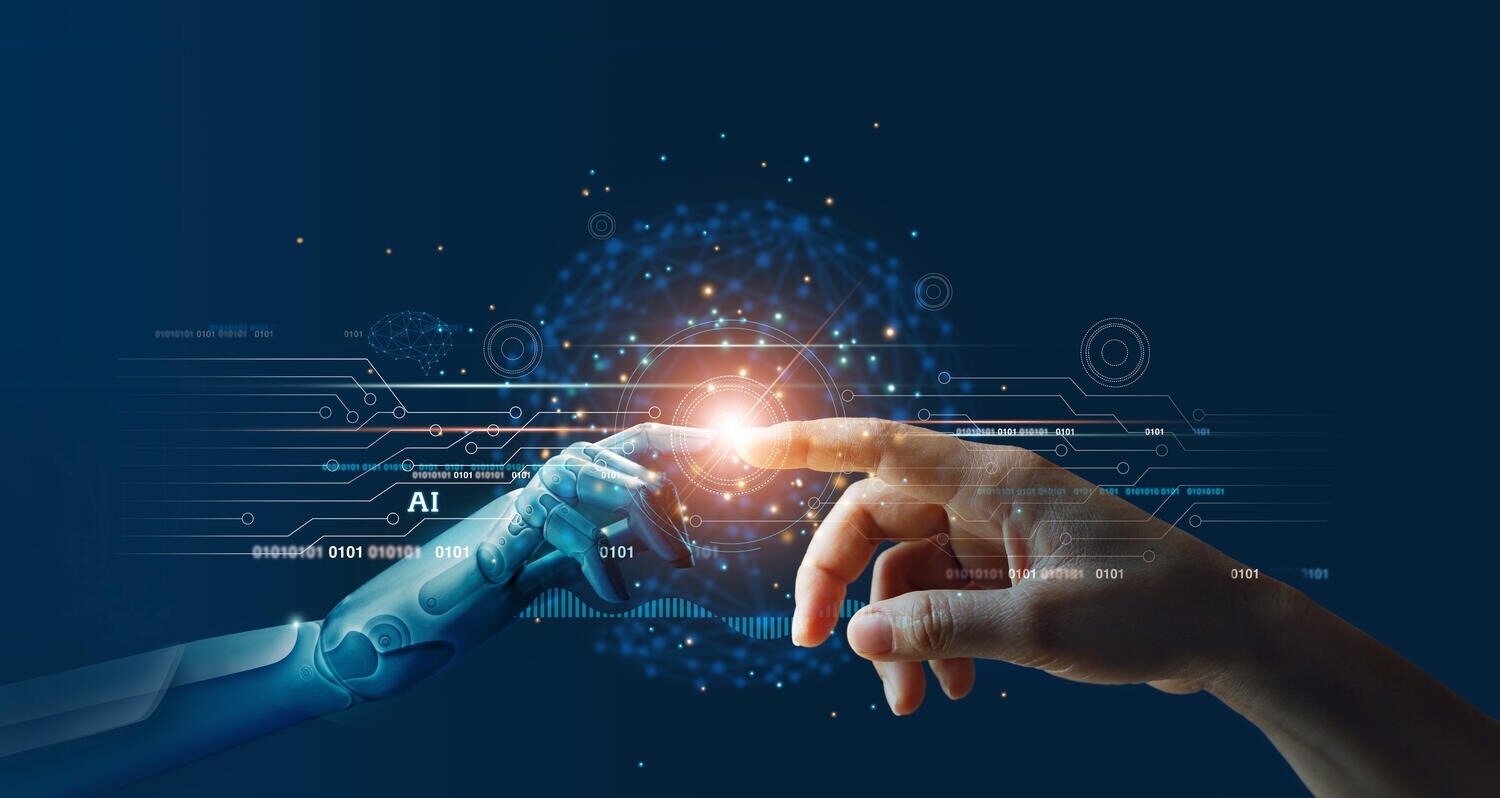 Hand of robot touches human hand